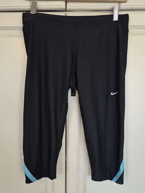 Nike Black Capri Leggings with Light Blue Hem Accents